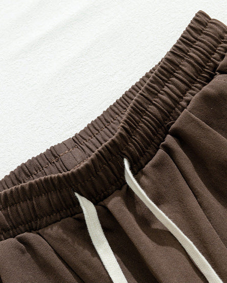 The Drift Pleated Cotton Trousers
